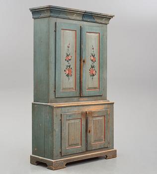 A polychrome-painted cabinet from Jämtland, Sweden, dated 1824.