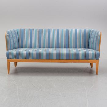 An 'Ulla' oak sofa by Carl Malmsten, 1964.
