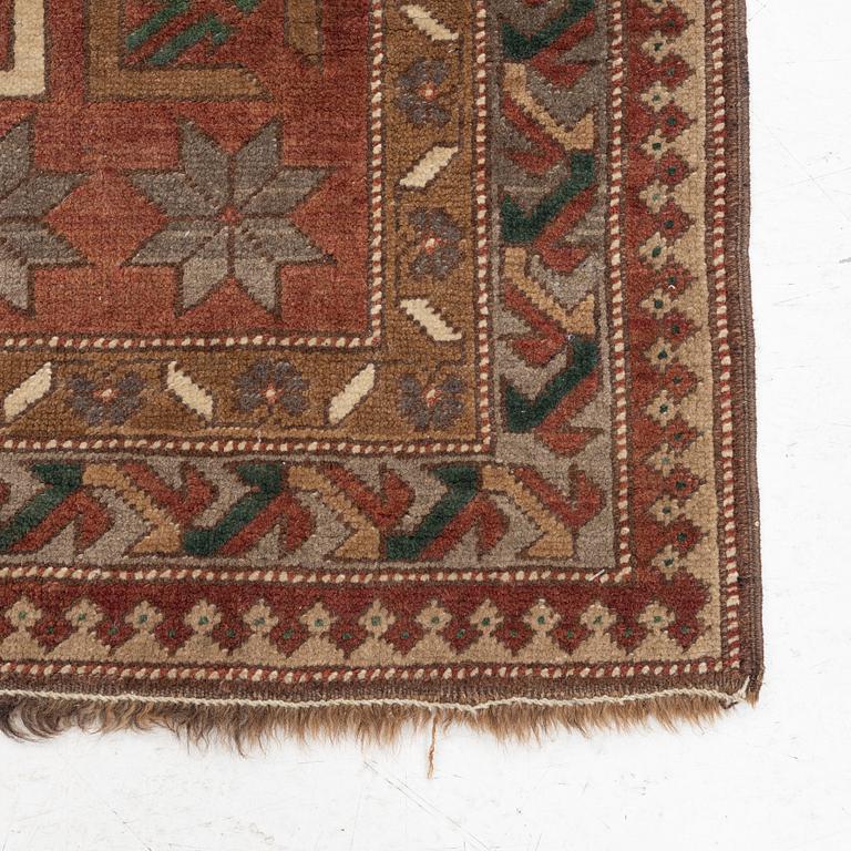 A Kazak rug, semi-antique, c. 137 x 148 cm.