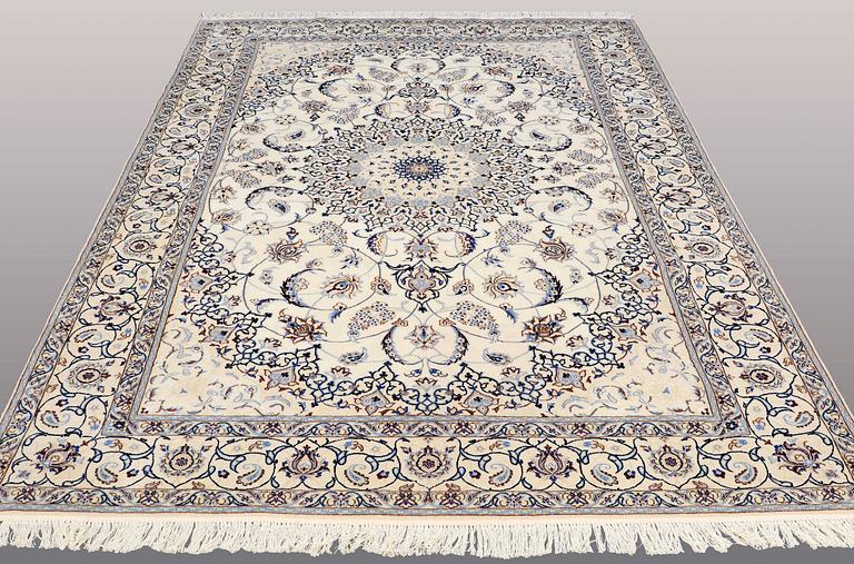 A CARPET, Nain part silk, s.k 9LAA, ca  303 x 202 cm.