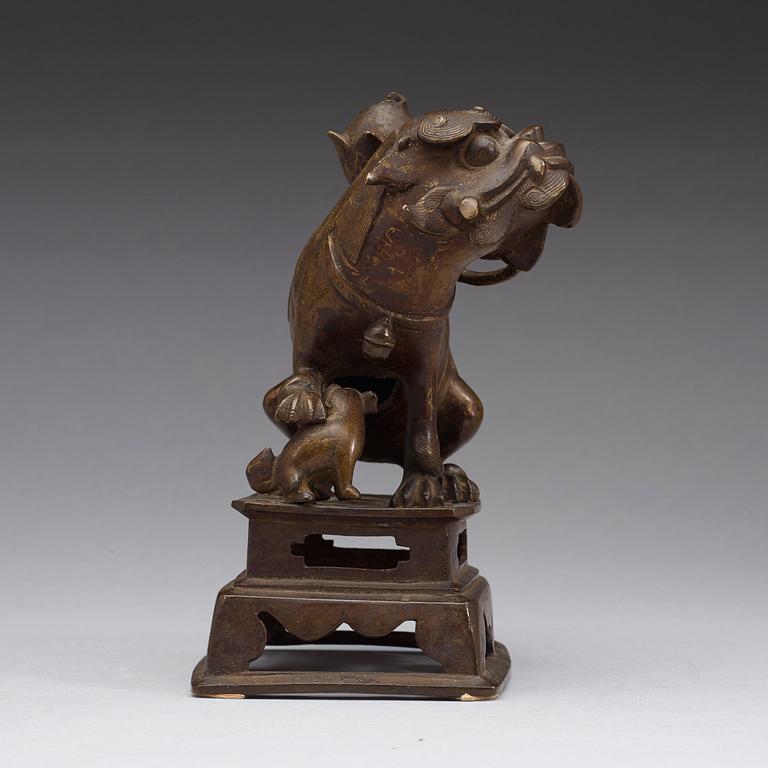 A bronze figurine of a mythological animal, presumably Ming dynasty (1368-1643).
