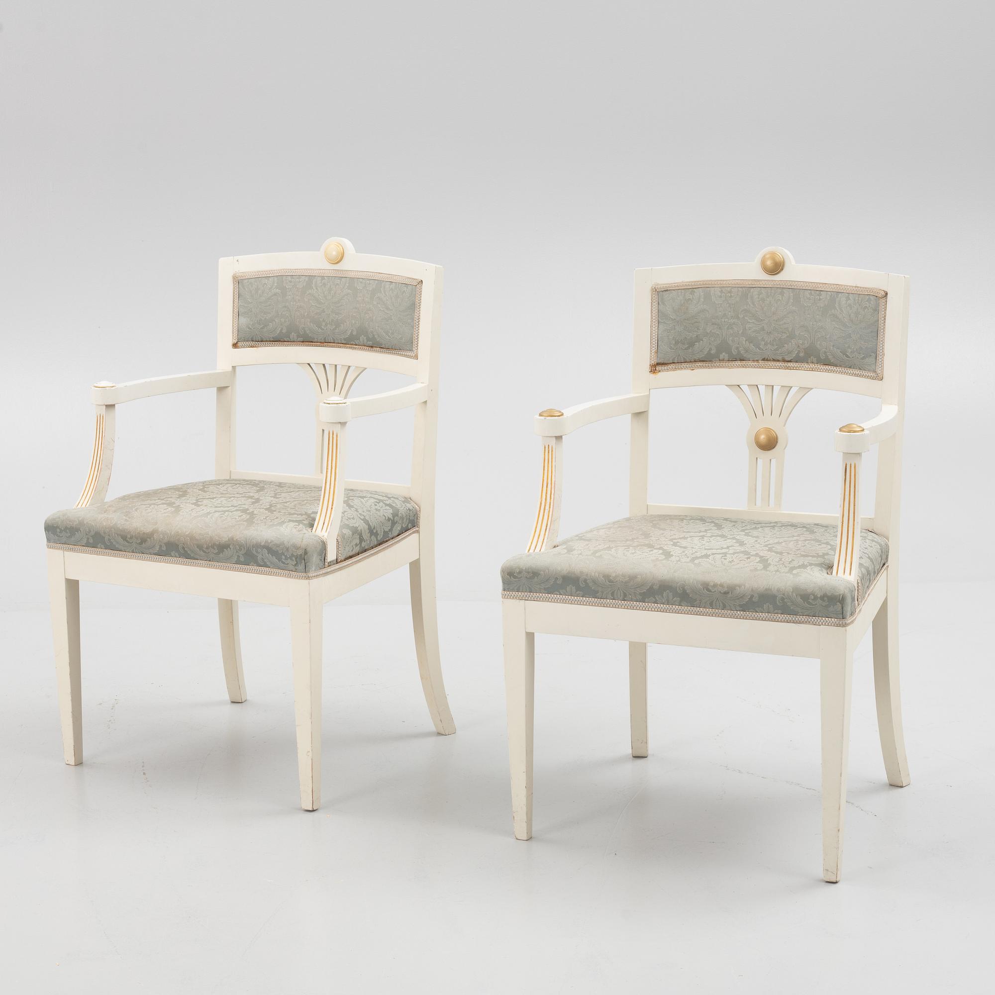 A pair of Empire style armchairs, 20th century.