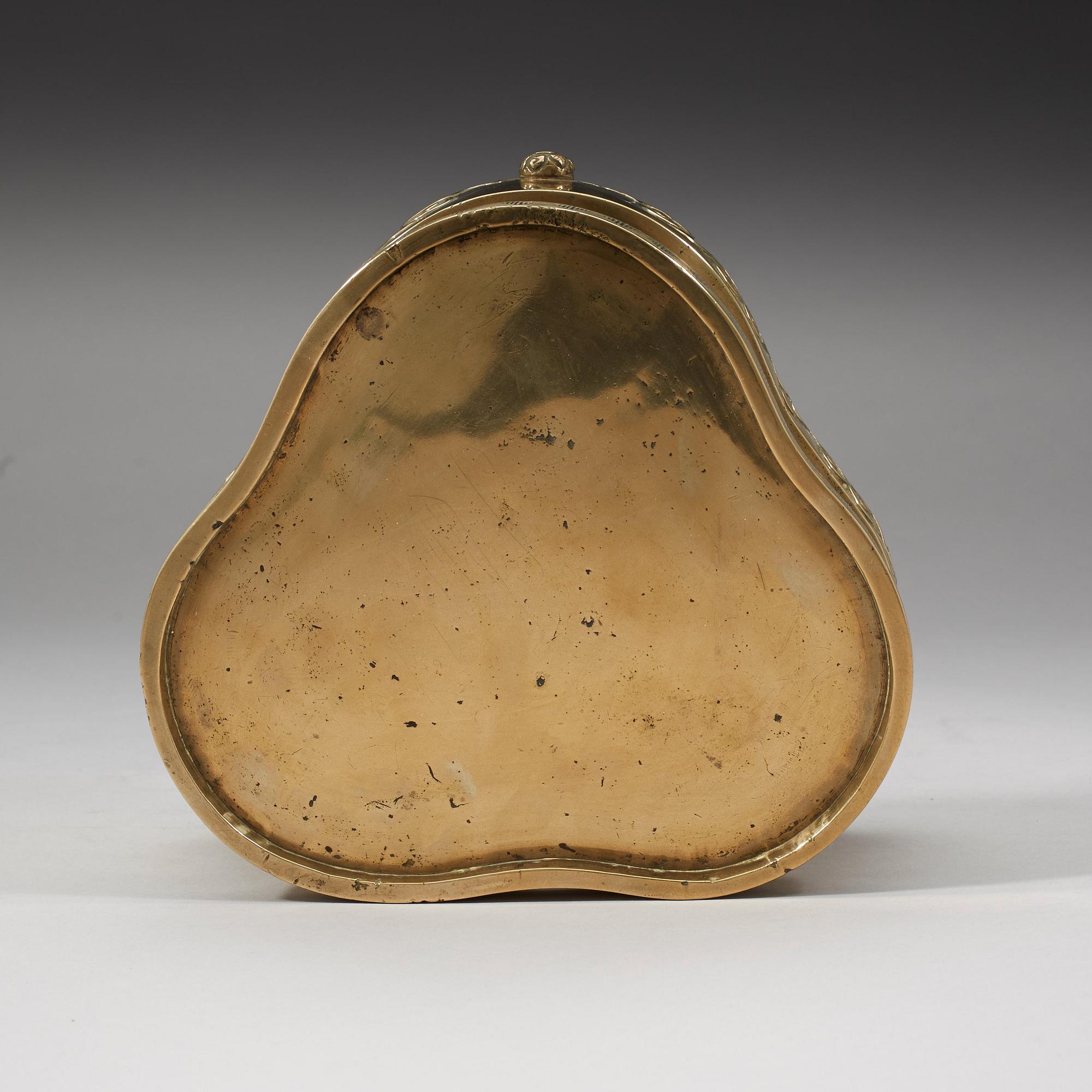 A polished copper alloy stand, Qing dynasty, 18/19th Century.