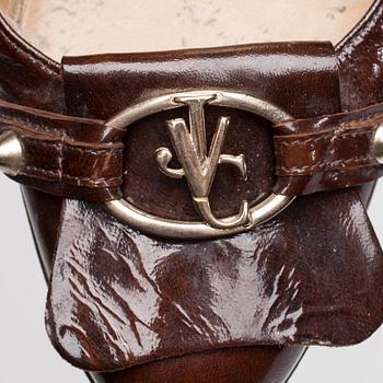 SKOR, Versace.
