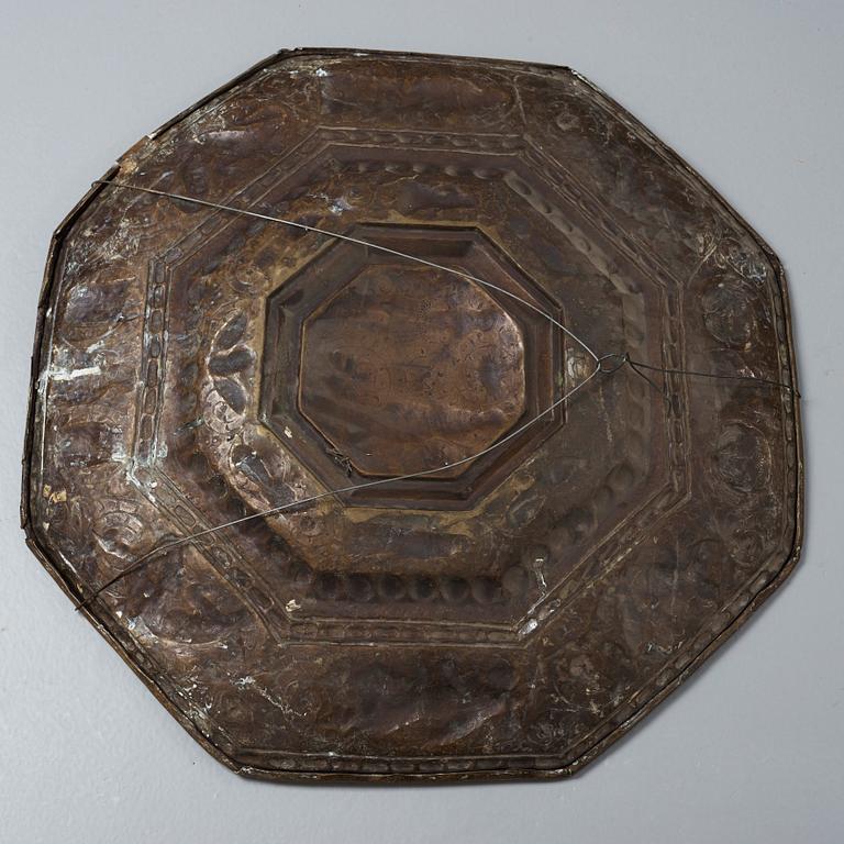 A Baroque presumably Dutch/Flemish brass reflector plate, mid 17th century.