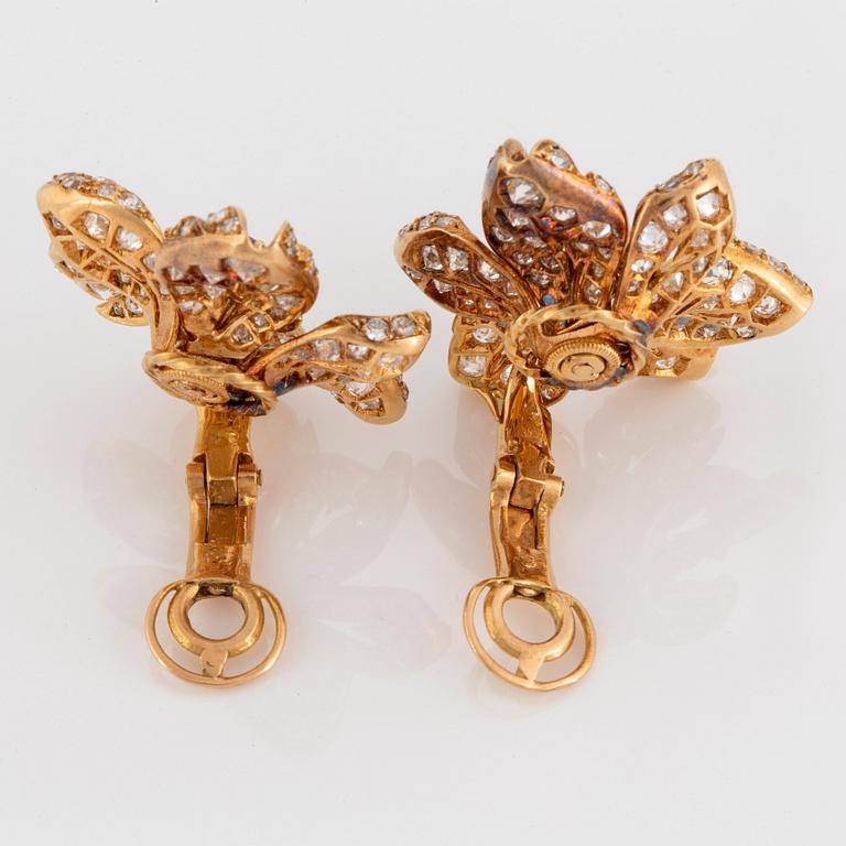 A pair of 18K gold earrings Monture Boucheron set with rubies and old- and eight-cut diamonds.