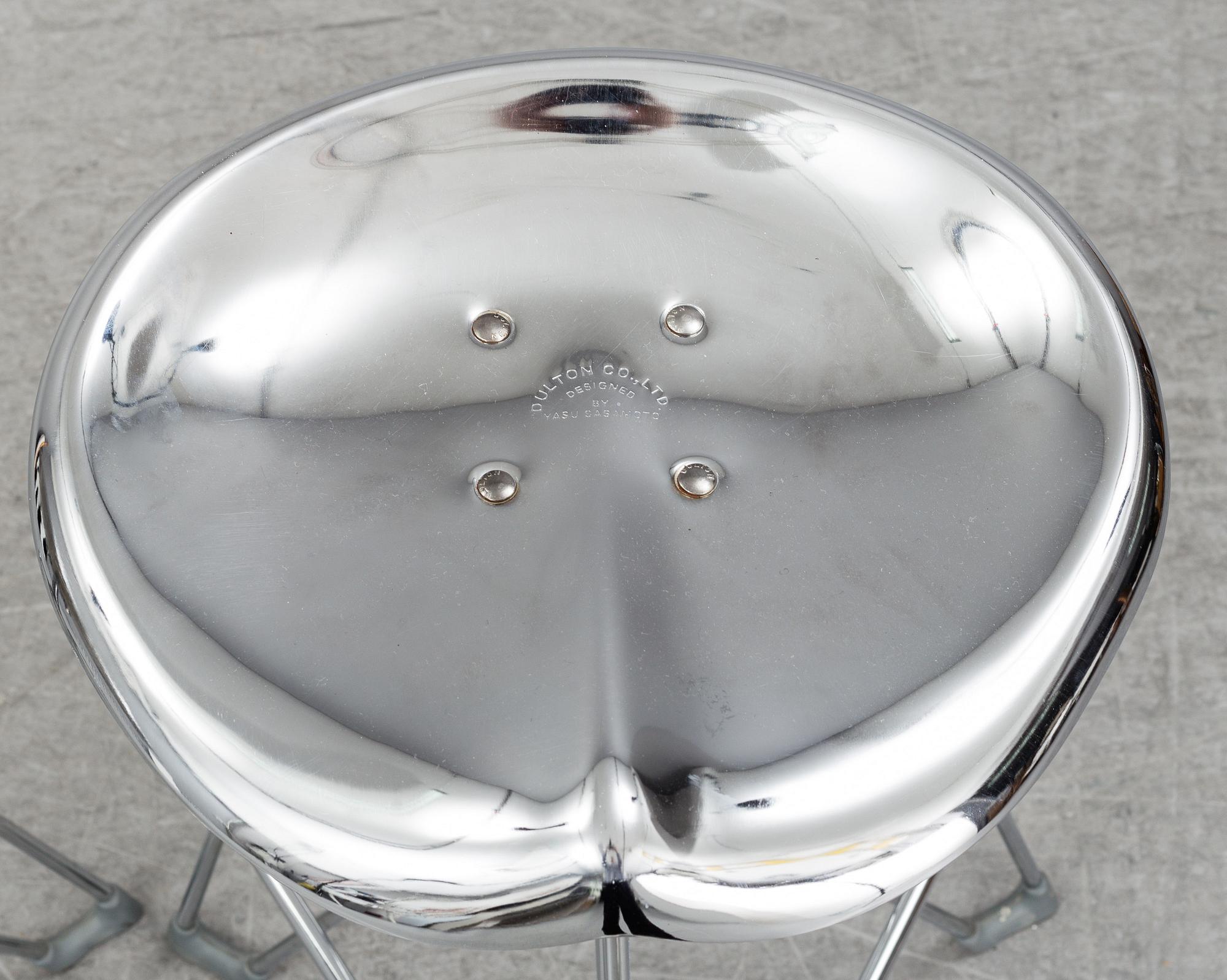 A pair of 'Dulton stools' by Yasu Sasamoto.