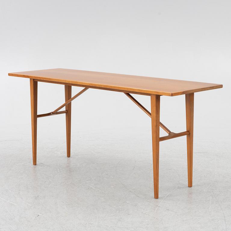 A coffee table/side table, Blomstermåla, circa the mid-20th century.