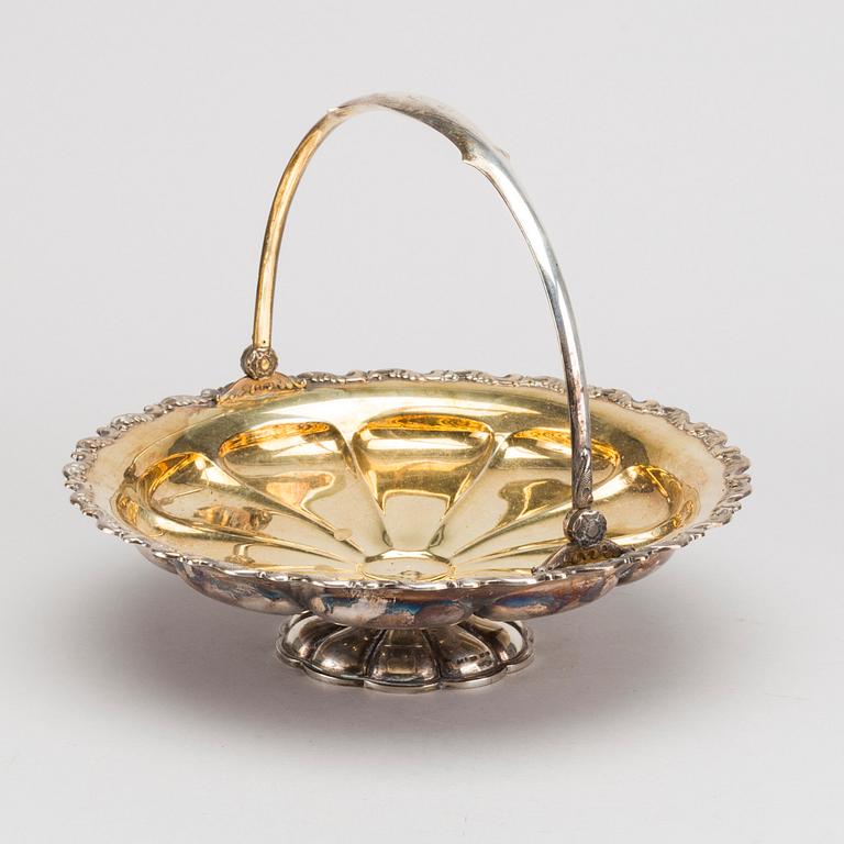 A finish silver bowl on foot with handle, 1935. Weight app. 560 gram.