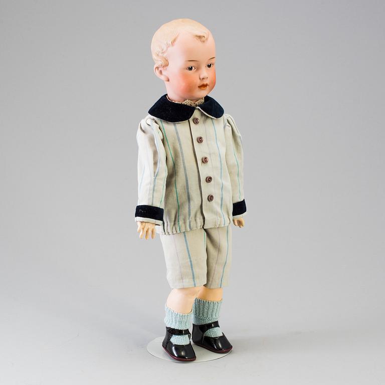 A bisque headed boy doll 7622 by Heubach, Germany, ca 1912.