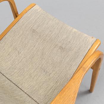 YNGVE EKSTRÖM, an oak 'Laminett' armchair from Swedese.