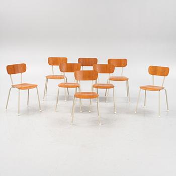 Eight teak veneered chairs, second part of the 20th Century.