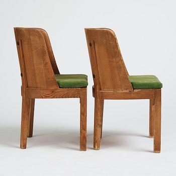 Axel Einar Hjorth, a pair of stained pine 'Lovö' chairs, Nordiska Kompaniet Sweden 1930s.