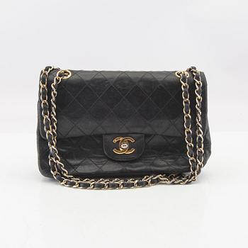 Chanel, a "Double Flap Bag".