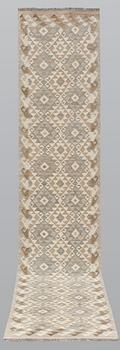 A runner, kilim, ca 387 x 79 cm.