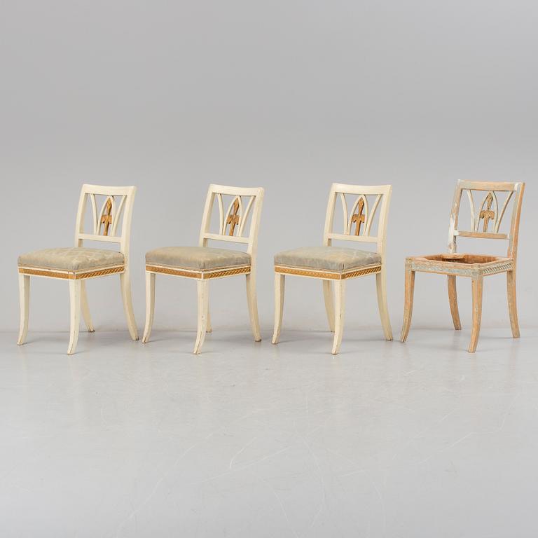 A set of four early 1800s chairs.