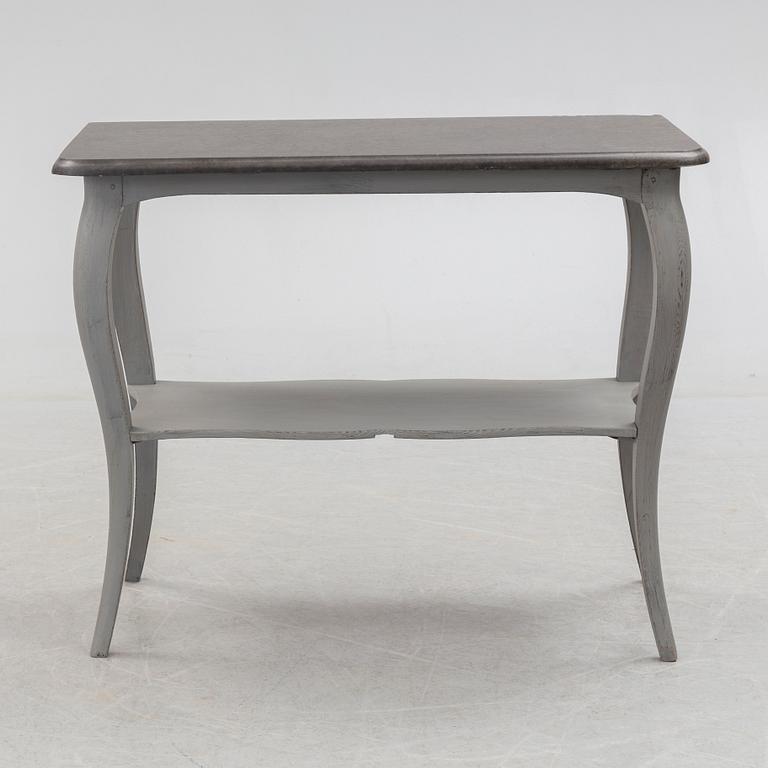 A first half of the 20th century painted table with marble top.