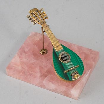 An Italian silver gilt and malachite miniature guitar, first half of the 20th century.