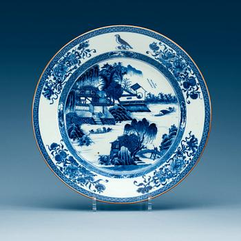 1769. A blue and white armorial serving dish, Qing dynasty, Qianlong (1736-95).