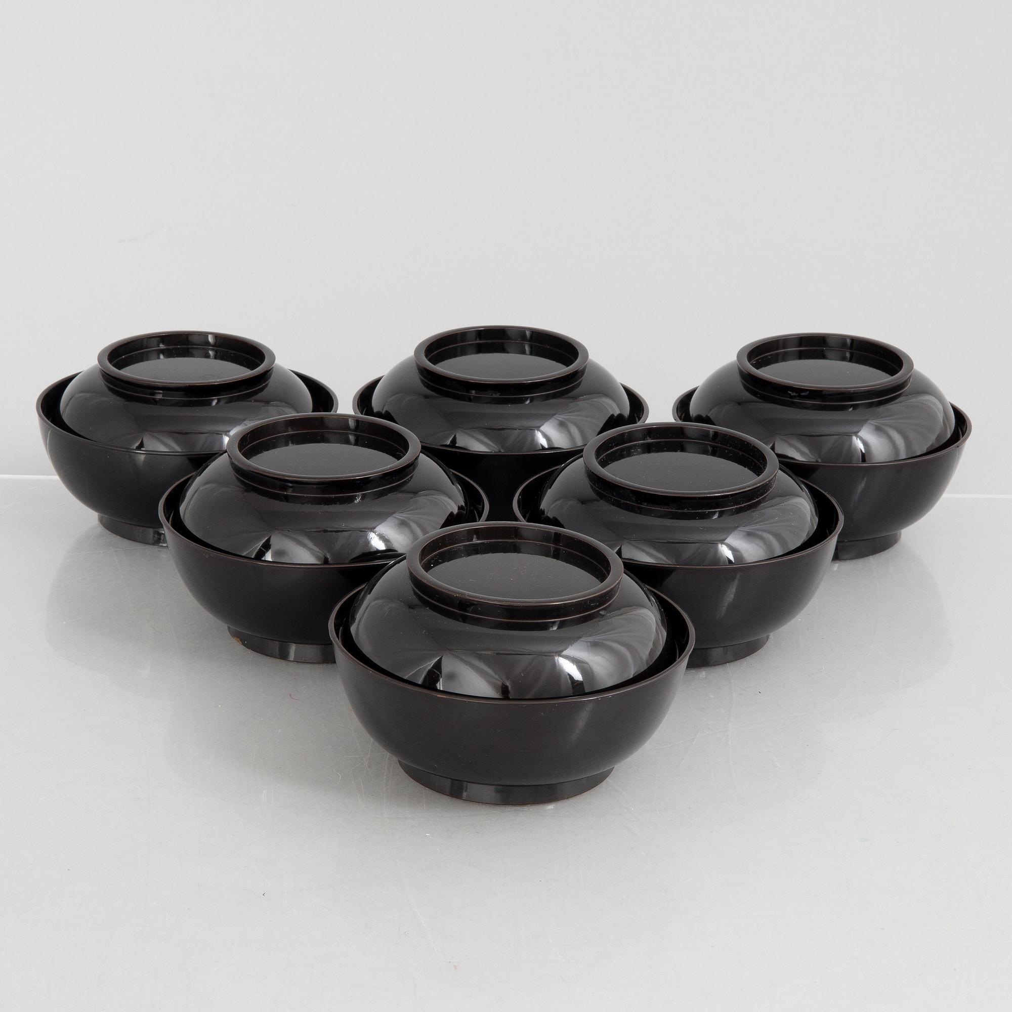 A set of six Japanese lacquer bowls with covers, 20th century.