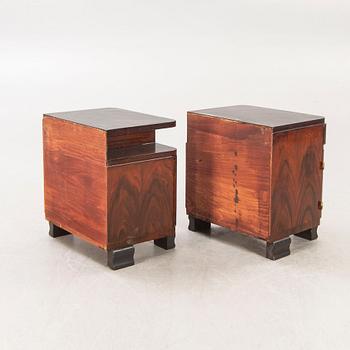 A pair of Art Deco 1940s walnut bedside talbes.