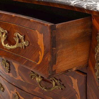 A French Louis XV marquetry and gilt-bronze mounted commode 'Aux bustes de femmes", later part of the 18th century.