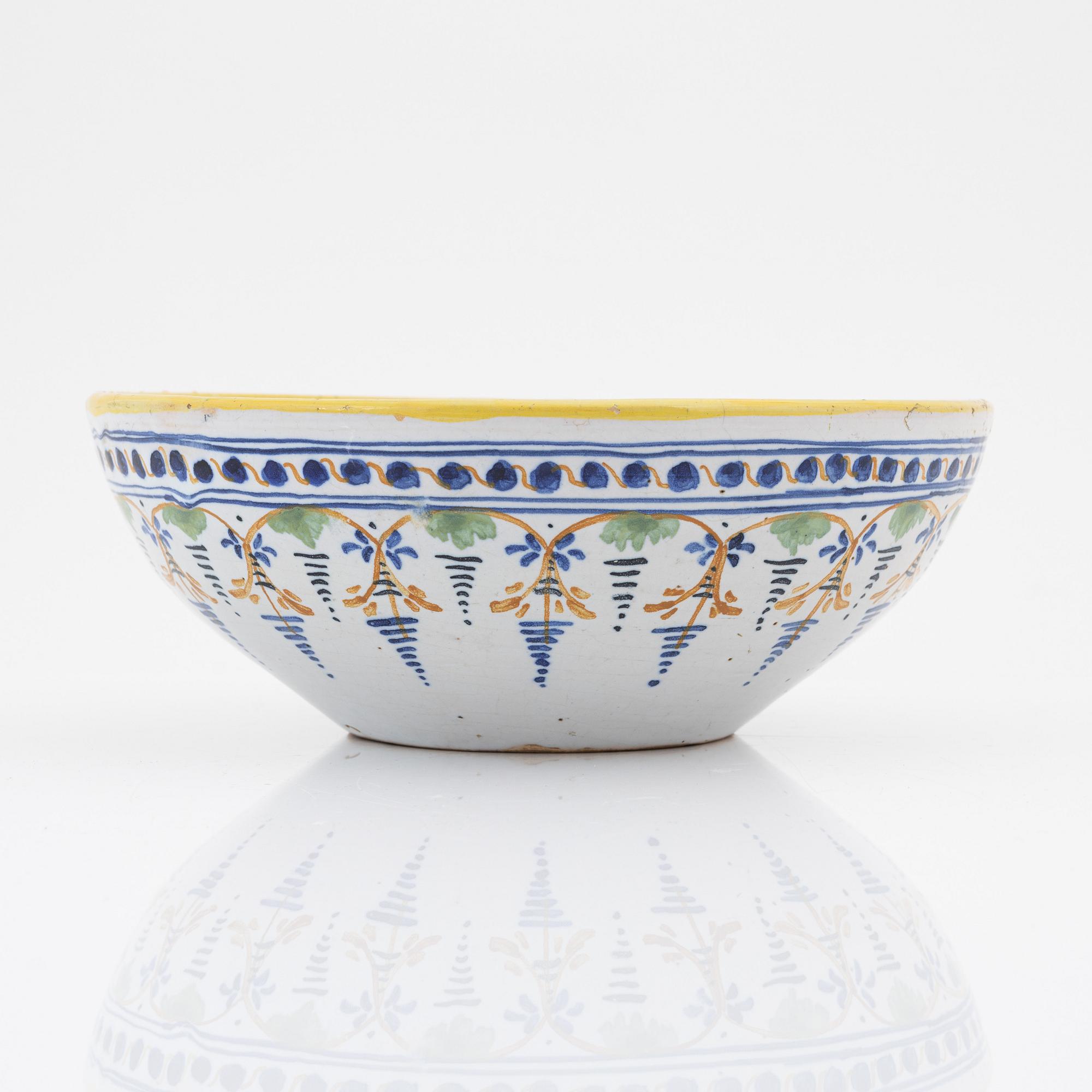 A faience bowl, 18th Century.