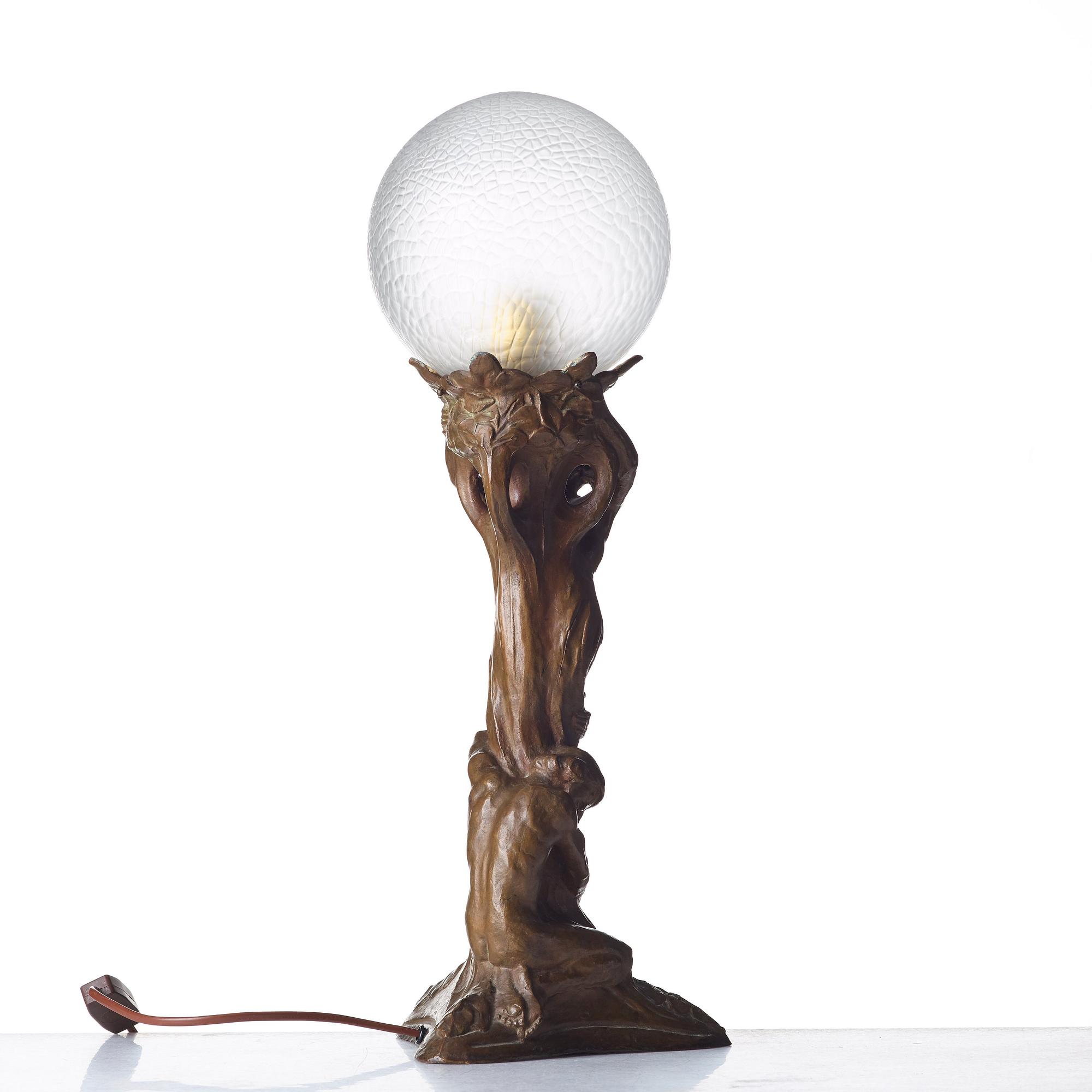 Alice Nordin, an Art Nouveau "Night and Morning" patinated bronze table lamp, Herman Bergman, Stockholm, early 20th century.
