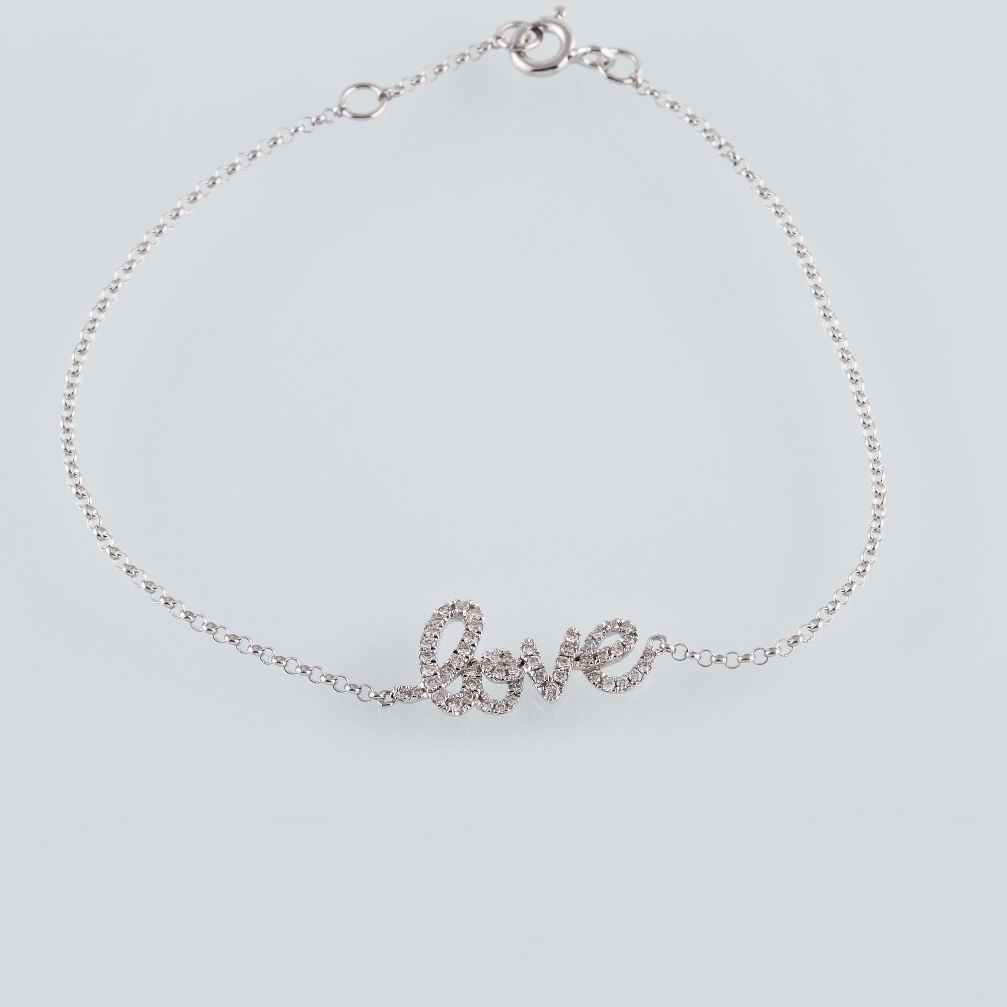 ARMBAND, 18K vitguld med briljantslipade diamanter ca 0.22 ct. Vikt 1,6 gram.