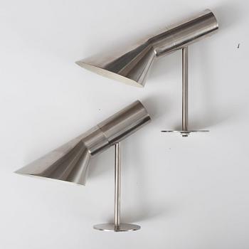 A pair of Arne Jacobsen steel 'AJ' wall lights, Louis Poulsen, Denmark.