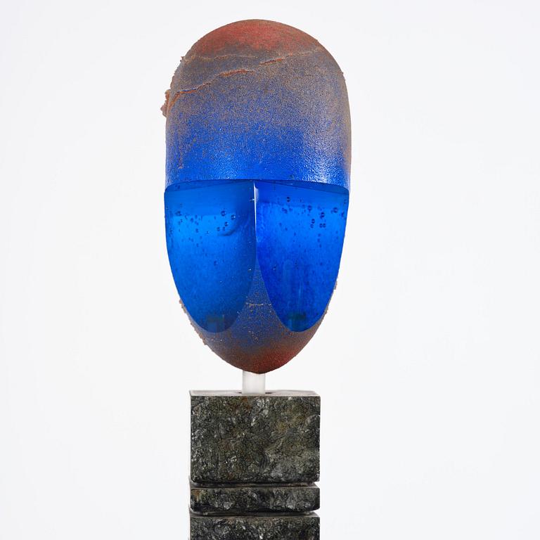 Bertil Vallien, a unique sand-cast glass sculpture of a head, on a high pedestal of polished limestone, Kosta Boda.