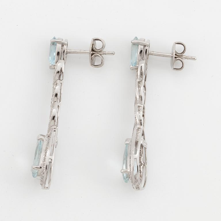 Pear faceted aquamarine and eight cut diamond earrings.