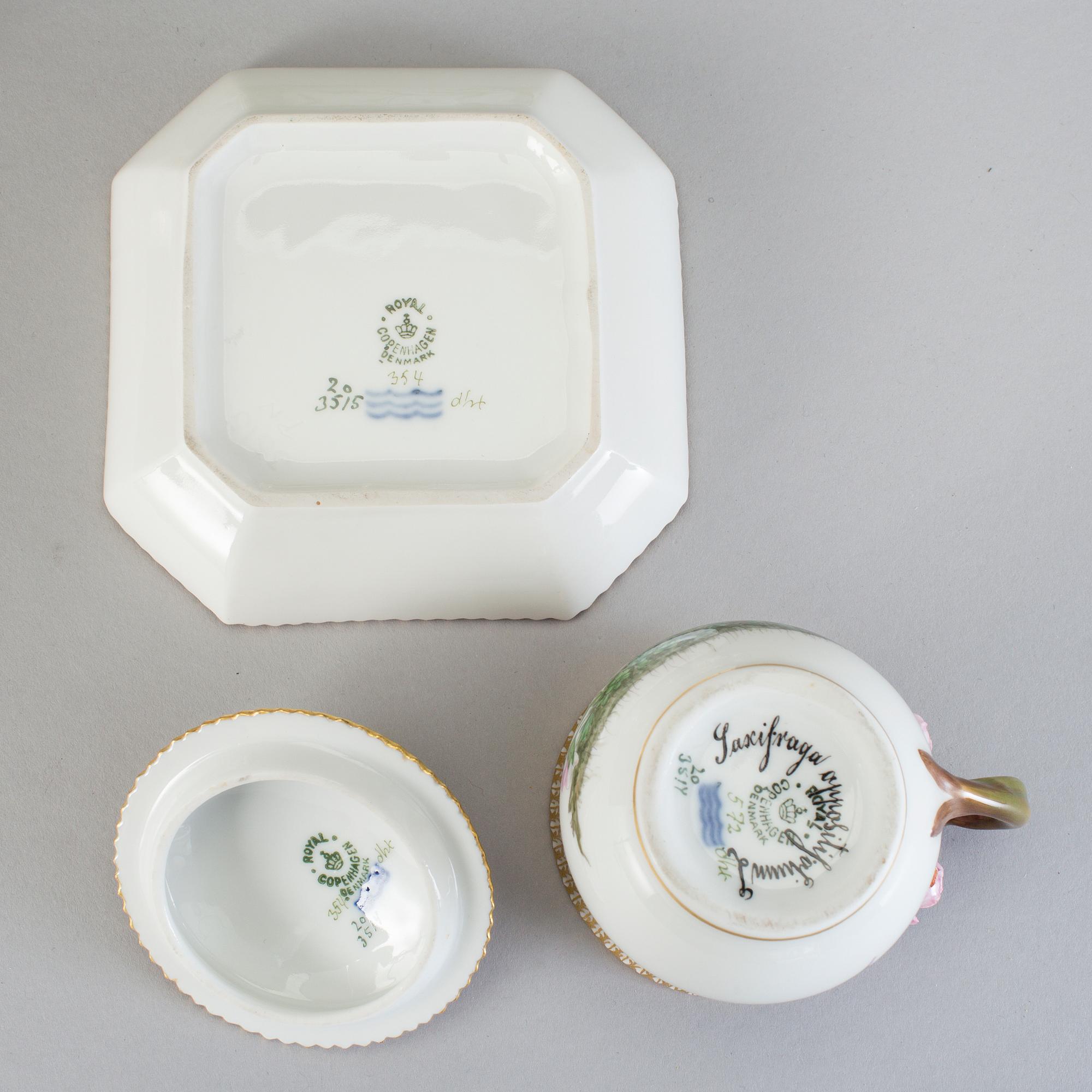 A set of seven Royal Copenhagen 'Flora Danica' custard cups with stands, 20th Century.