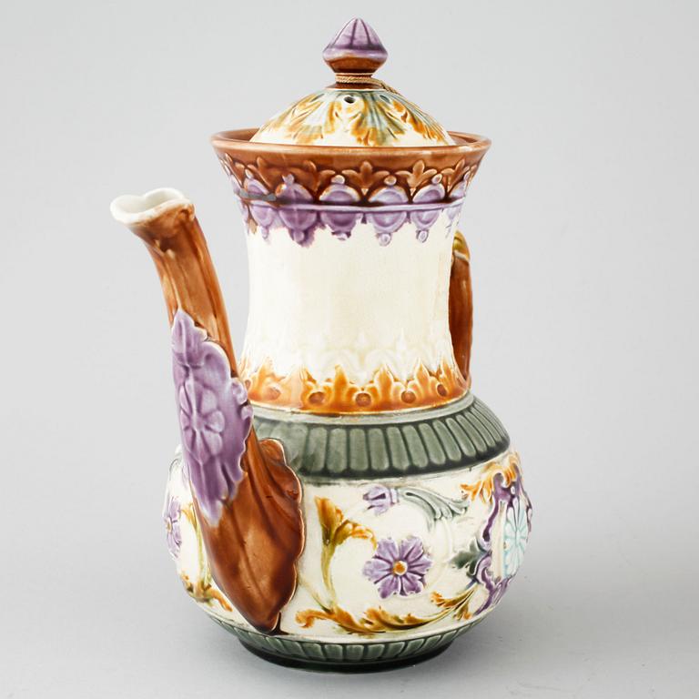 A majolica collection of one coffee pot and three tea pots from Rörstrand, around turn of the century 1900.