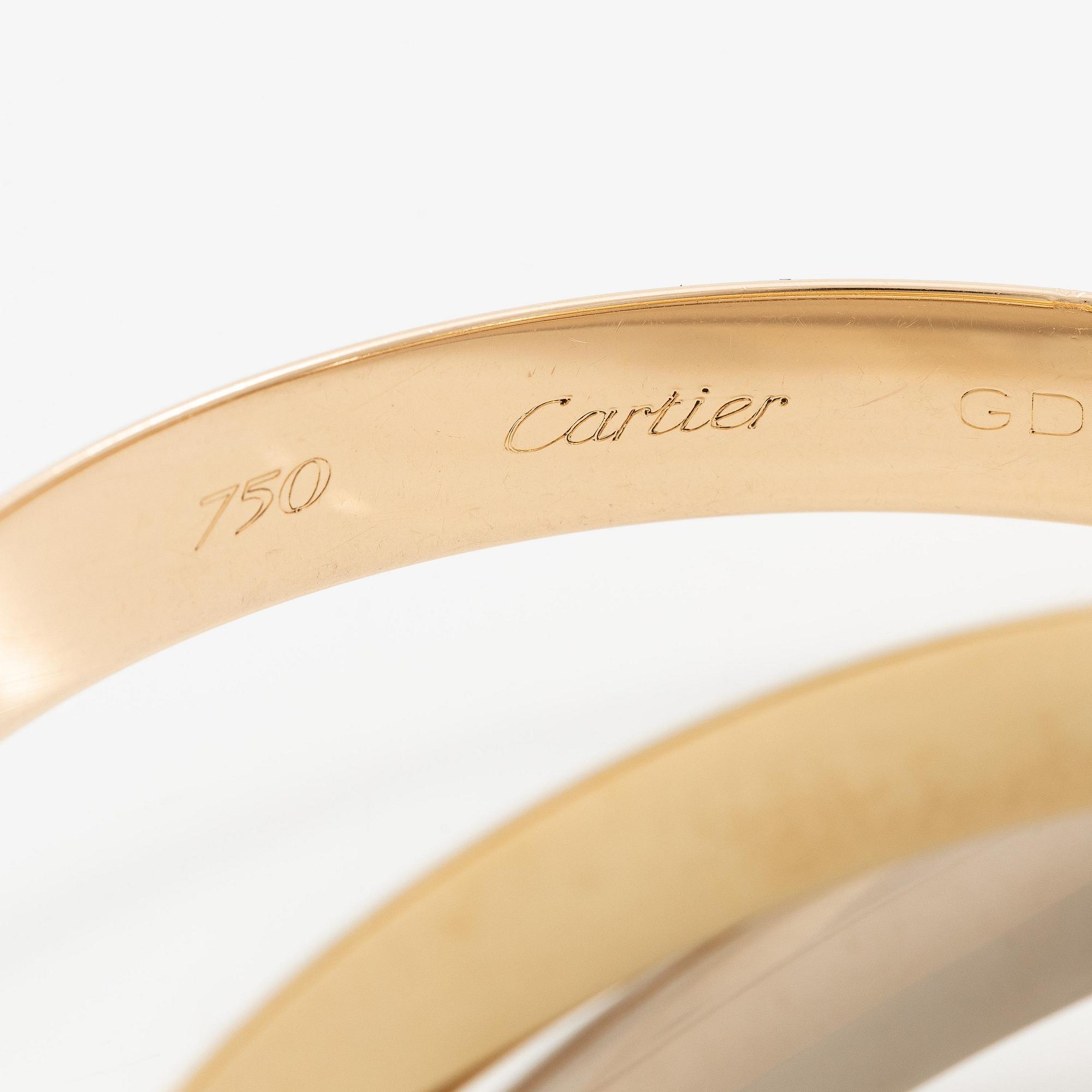 Cartier a bracelet "Trinity" 18K gold in three different colours.