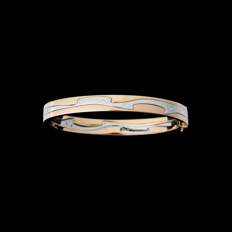 GEORG JENSEN, ARMRING, "Fusion", 18K guld i tre färger, briljantslipade diamanter.