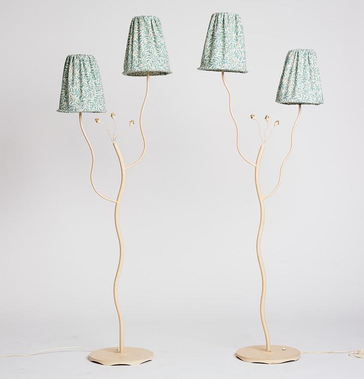 Swedish Modern, two lacquered metal floor lamps, 1940's-50's.