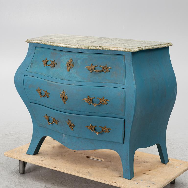 A Rococo style chest of drawers, early 20th century.
