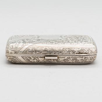 An English sterling silver cigarette case, maker's mark William M. Hayes, of Birmingham, 1896.