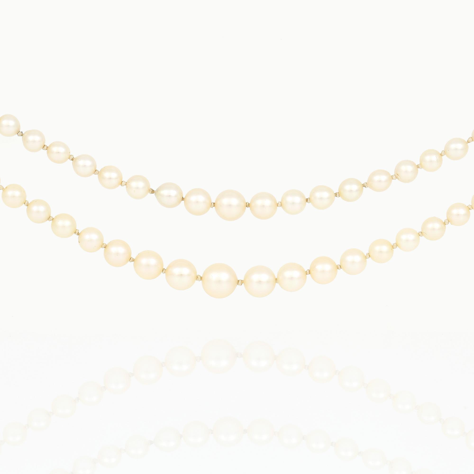COLLIER, med odlade pärlor samt lås i guld 18 k, 1900-tal.