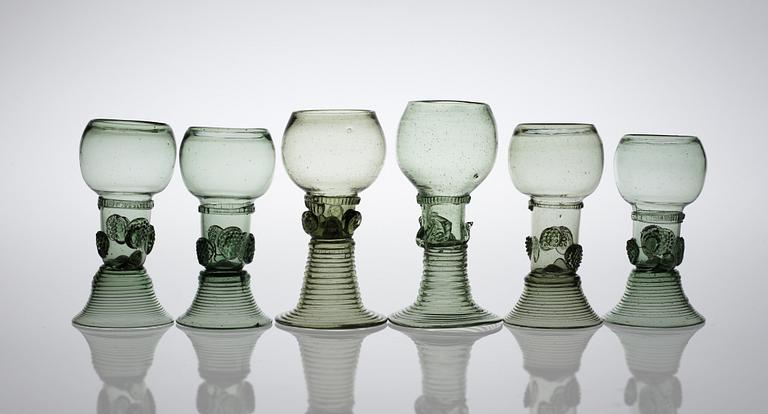 A set of 6 green white wine glasses, 18th century.