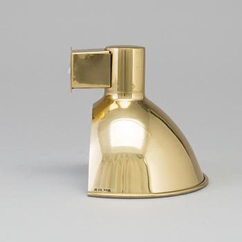 A brass wall light by Josef Frank, Firma Svenskt Tenn, model 32389.