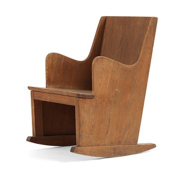 254. Axel Einar Hjorth, a stained pine "Lovö" rocking chair, Nordiska Kompaniet, Sweden, 1930s.