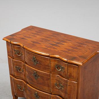 A Northern-European late baroque chest of drawers, mid 18th century.