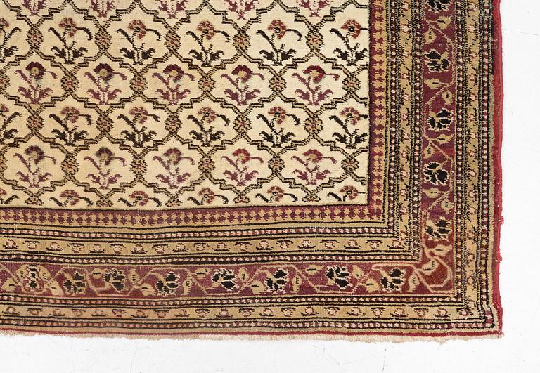 An antique Agra carpet Of Mughal 'Shrub' design, northern India, c. 270 x 180 cm.