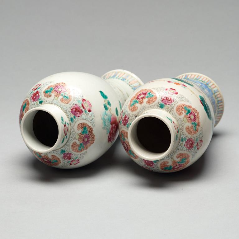 A pair of famille rose vases with covers, Qing dynasty, Qianlong (1736-95).