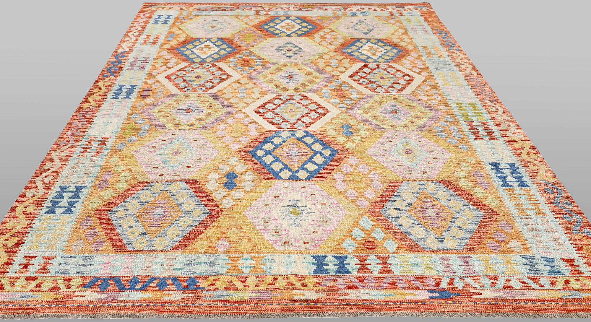 A Kilim rug, approx. 299 x 205 cm.