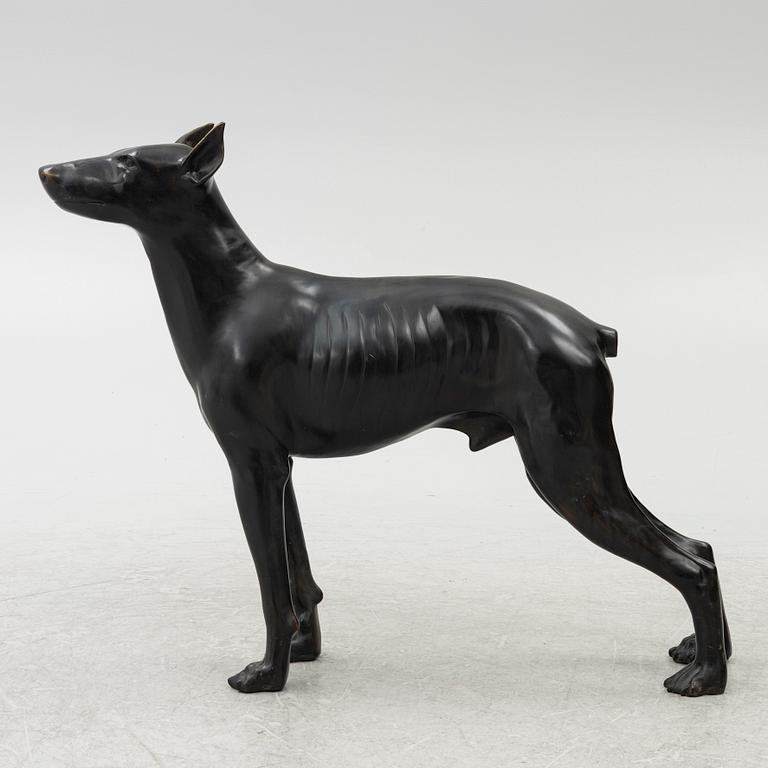 A decorative sculpture of a dog, 20th/21st century.