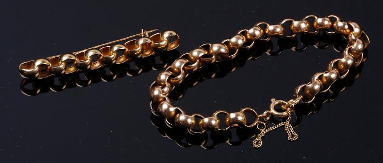 BROSCH samt ARMBAND, 18 k guld, otydl stämplar, 1900-tal. Ca 15 g.