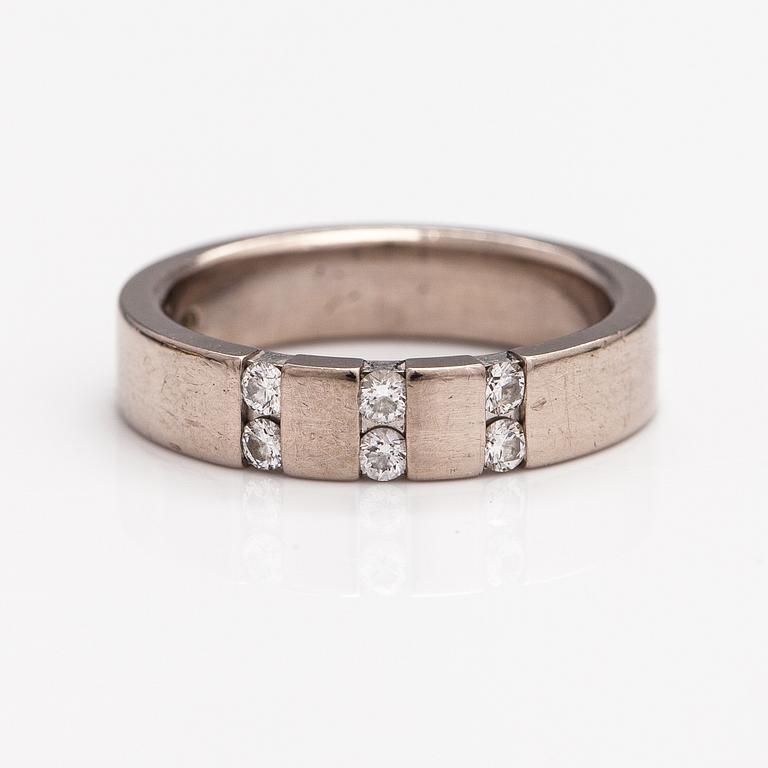 An 18K white gold ring with diamonds ca. 0.18 ct in total according to engraving. A Tillander, Helsinki 2005.